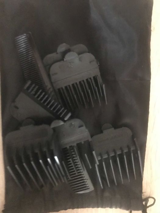 dois alisadores um secador e uma maquina de cortar cabelo usados