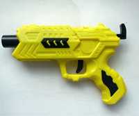 Іграшковий пістолет на орбізах