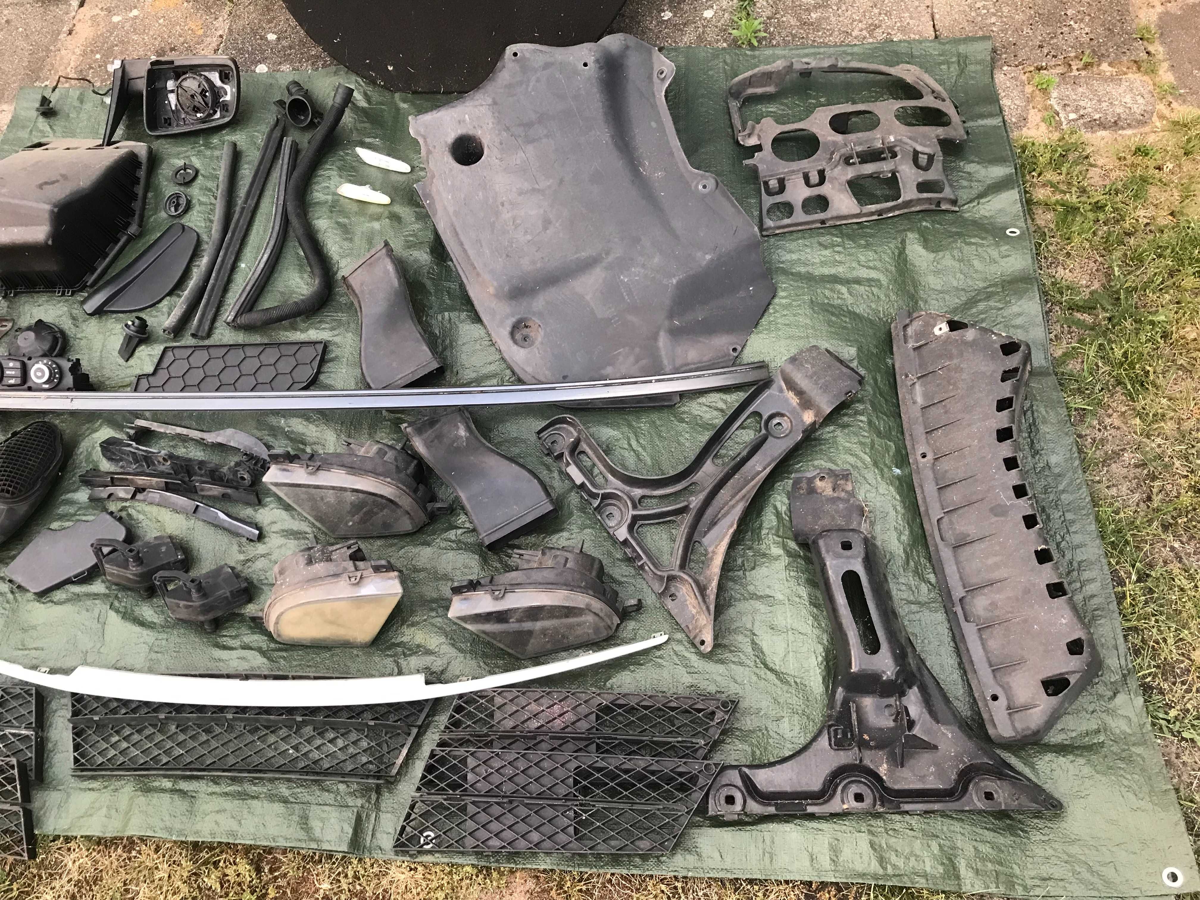 Części BMW e60 czujniki zaślepki listwy halogeny kratki