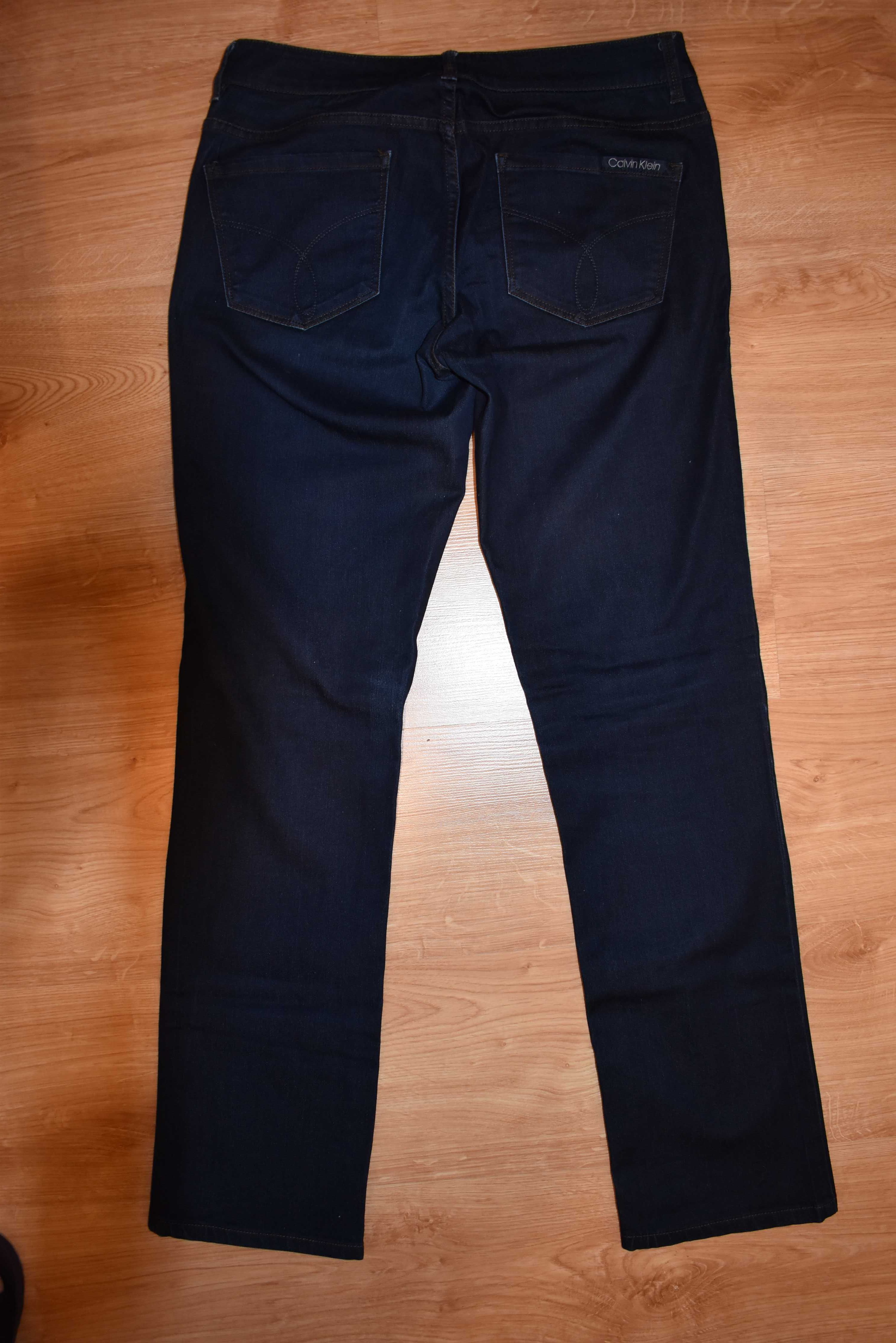 Calvin Klein Jeans Spodnie damskie granatowe. Rozmiar 28/6