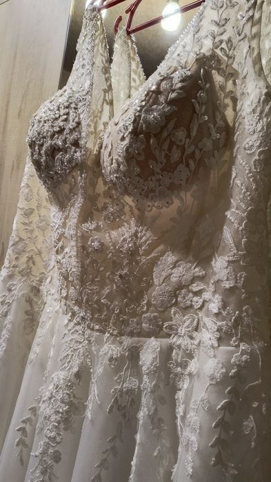 Śmietankowa suknia ślubna