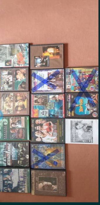 Продам dvd диски с фильмами и музыкой,подставка