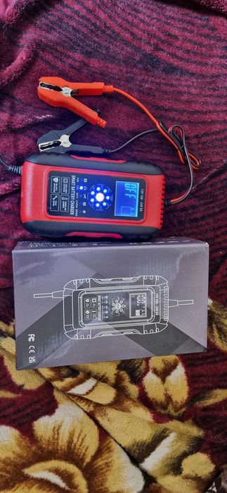 Автоматическое импульсное зарядное устройство новое на авто,мото и др