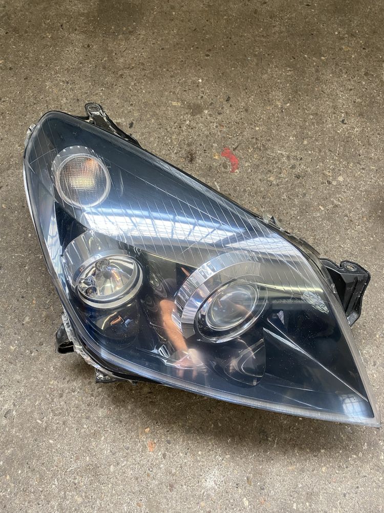 Prawa lampa XENON skrętny ASTRA H kompletna