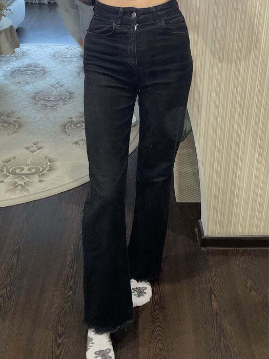 Джинсы клеш Джинси розкльошоні