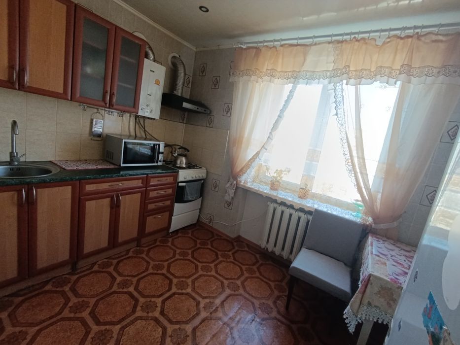 Подобово квартира в центрі м Ізюм,вул.Різдвяна.