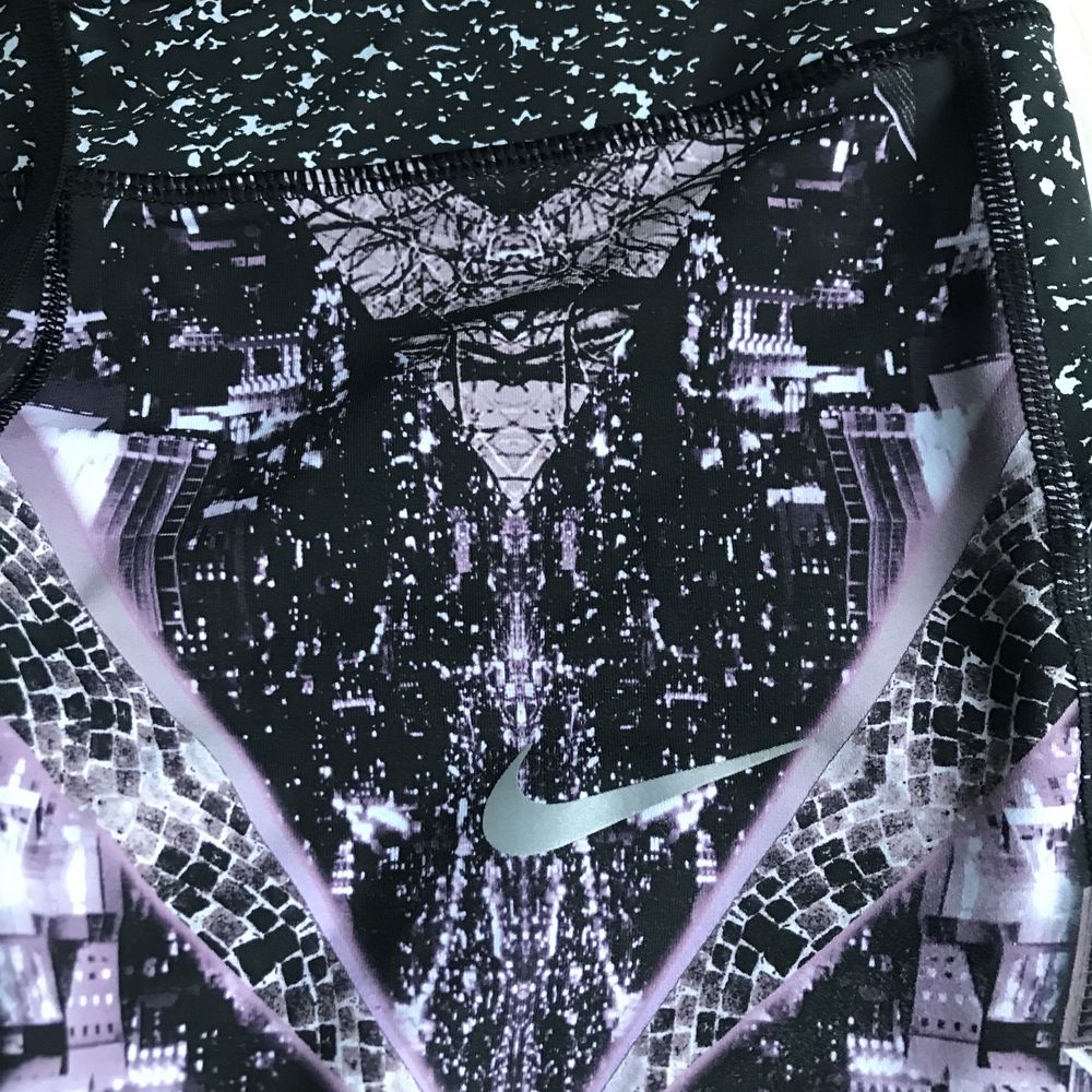 Legginsy Nike Running w S spodnie