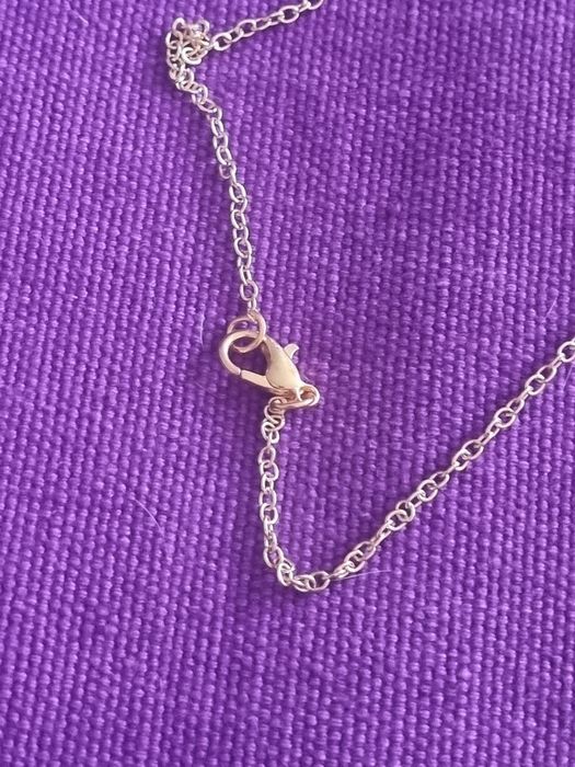 Łańcuszek z wizerunkiem Mateczki z Gwadelupe.