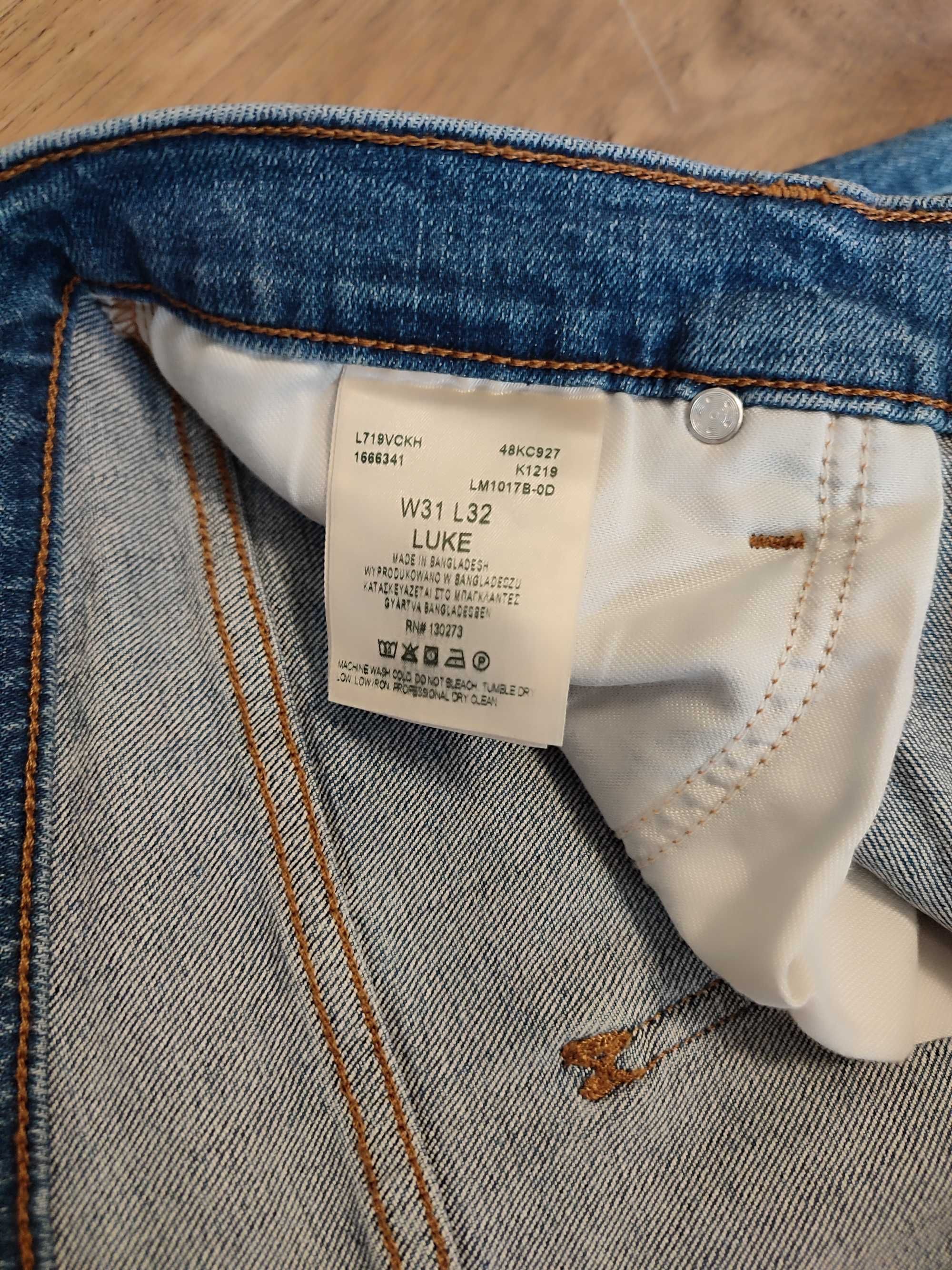 Джинси чоловічі Lee  Slim Tapered Luke розмір 31/32