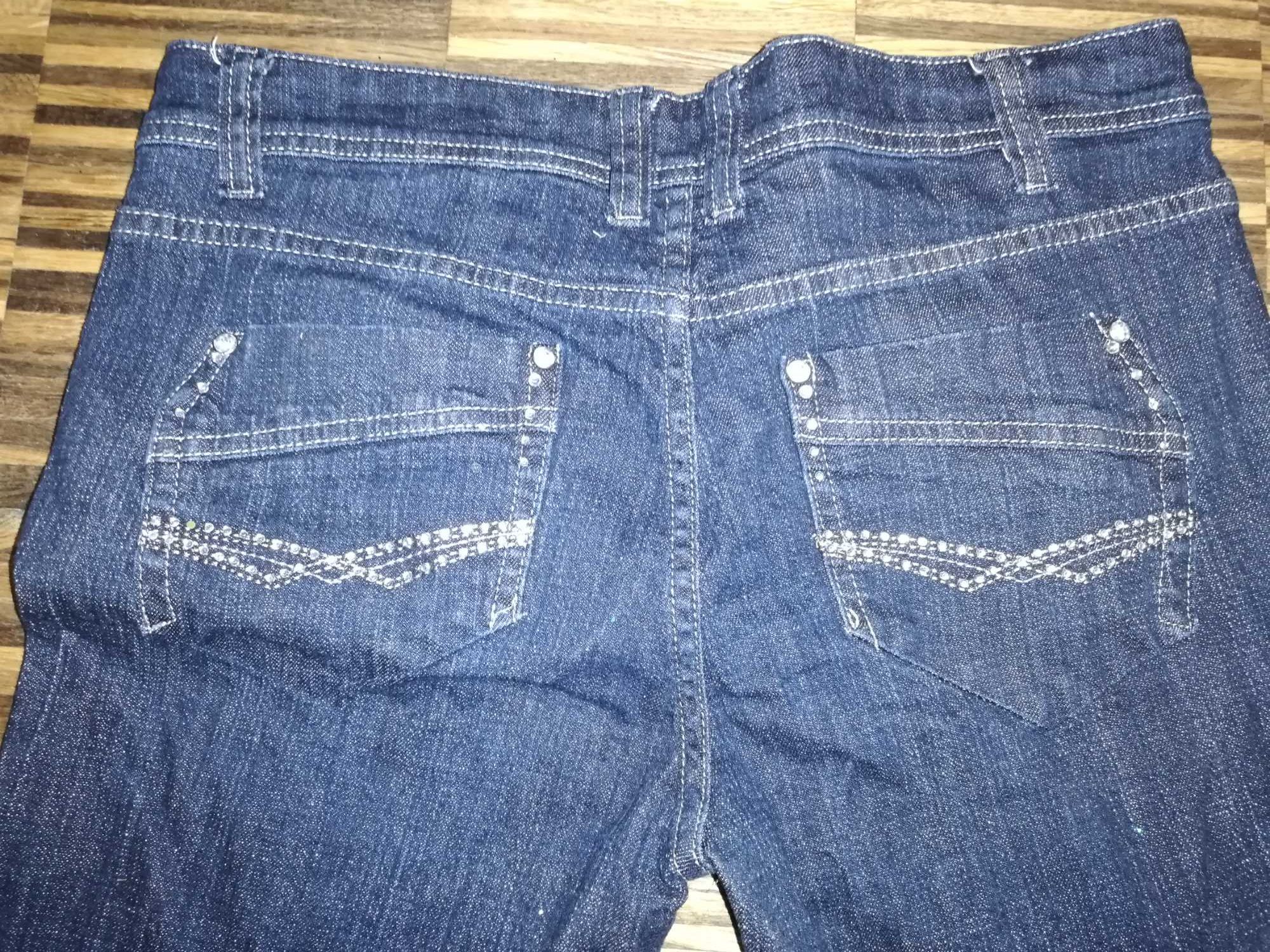 Damskie spodnie jeans rozm. 38/40