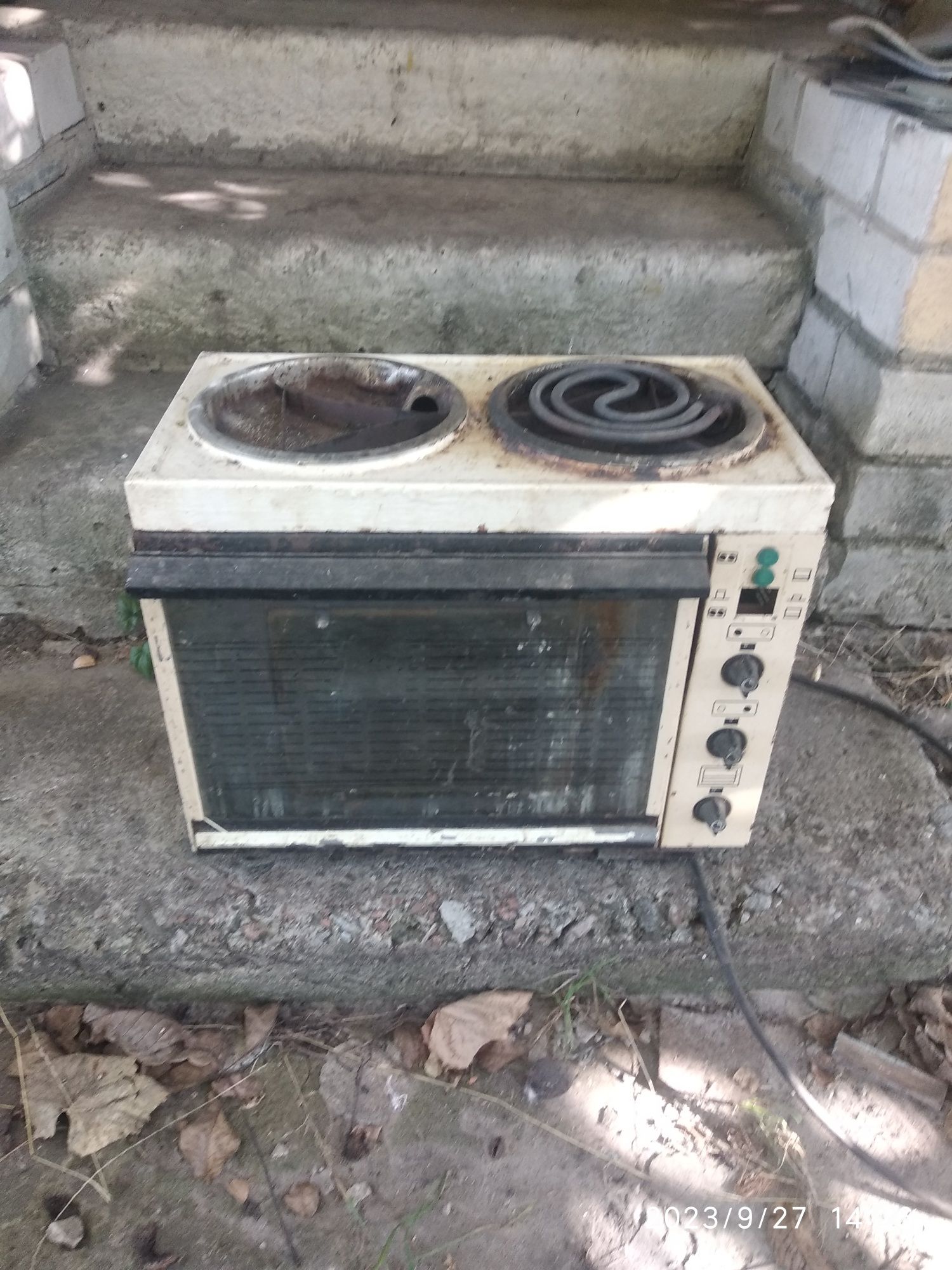 Електрическая печка с духовкой подоляночка