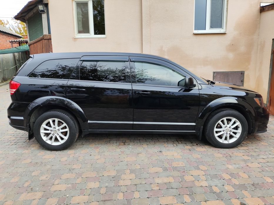 Продам Додж в отличном состоянии 7 мест