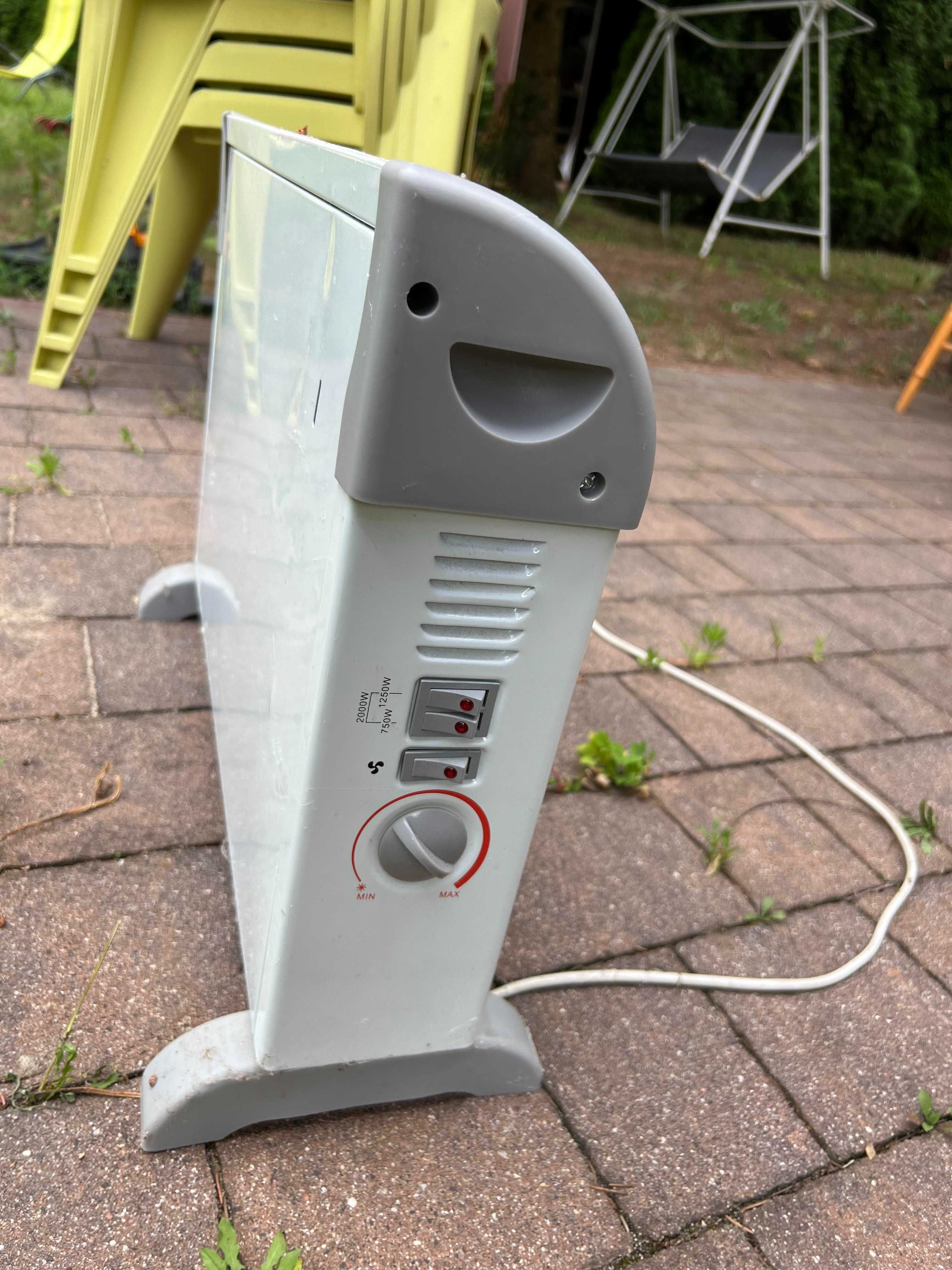 Grzejnik elektryczny Ravanson.