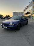 Toyota Corolla 1998 синього кольору на повному ходу, з переоформленням