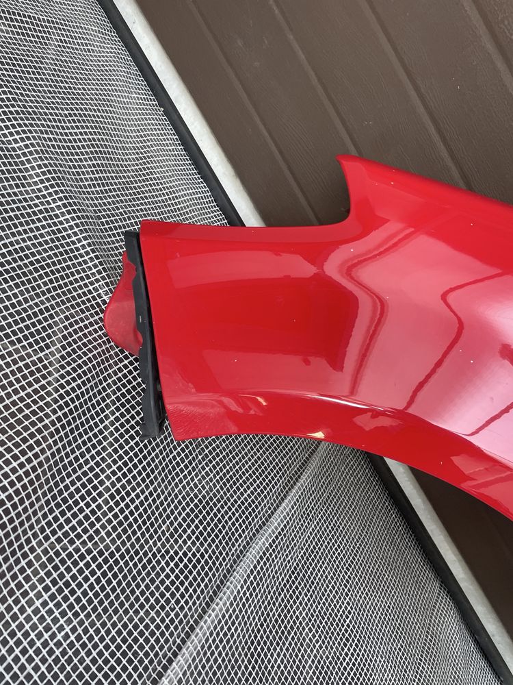 BŁOTNIK lewy przód Dacia Sandero 1  I 08-12r czerwony DV21D wysyłka