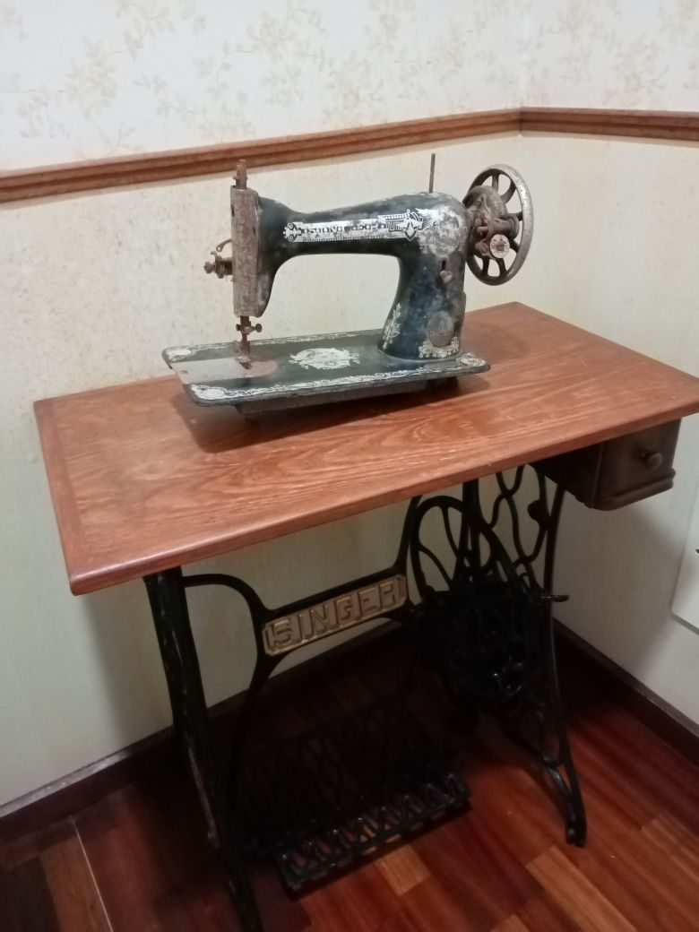 Máquina de costura singer