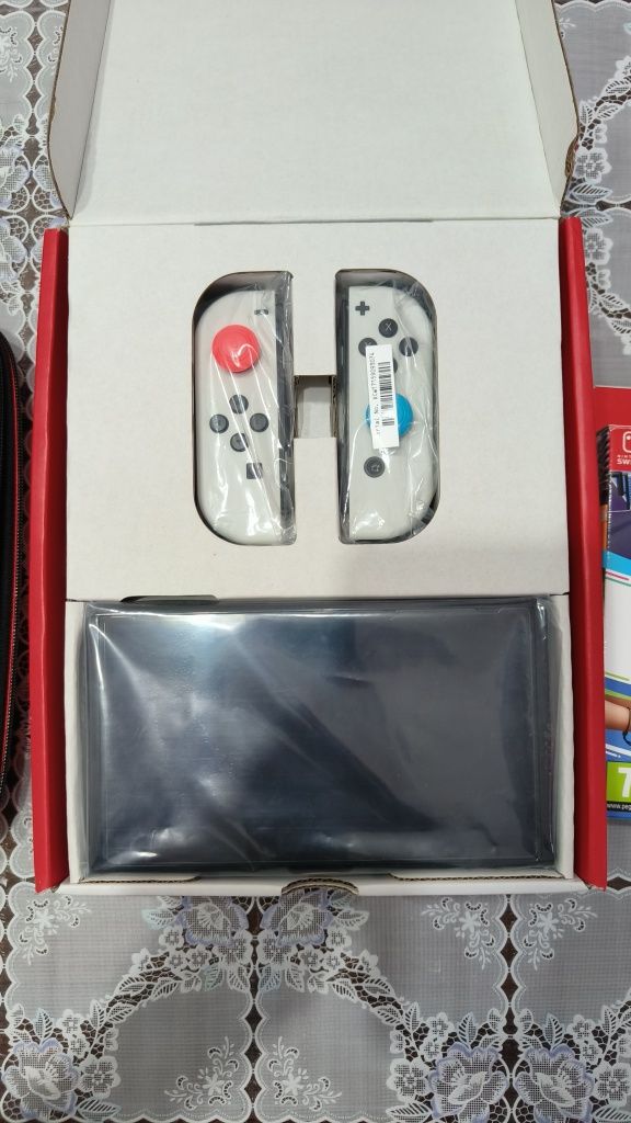 Nintendo Switch OLED + Switch Sports + Bolsa