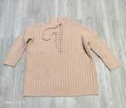 Pudrowo różowy sweter damski oversize z wiązaniem Sinsay