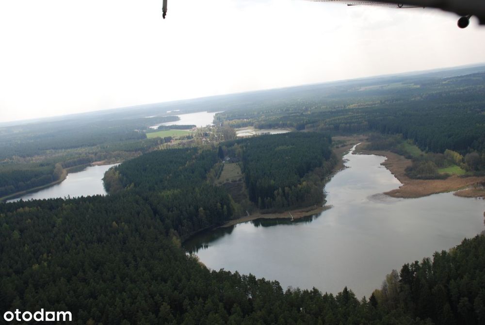 Piękna posiadłość z dużym terenem nad niezwykłą rzeką wśród jezior