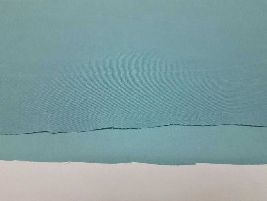 Podszewka jasna niebieska szer.152 cm.