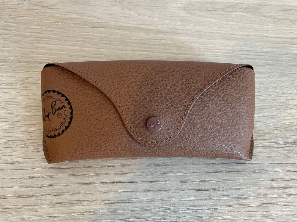Óculos dourado da Ray-Ban
