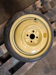 Koło dojazdowe 15 MAZDA 323F