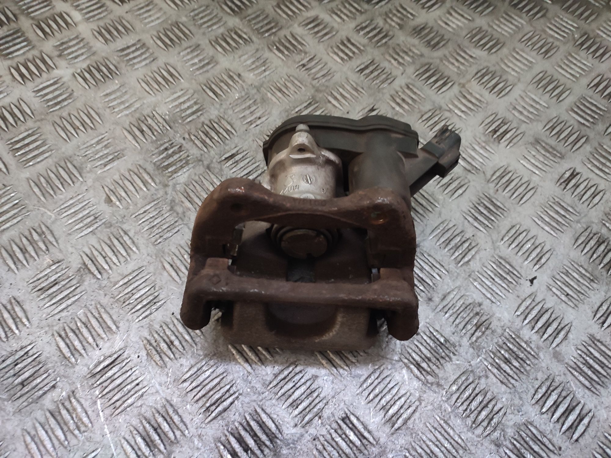 Renault Scenic III zacisk hamulcowy prawy tył tylny