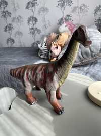 Динозавр іграшка