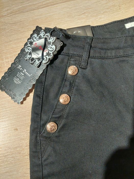 Nowe spodnie czarne jeansy z guzikami M 38