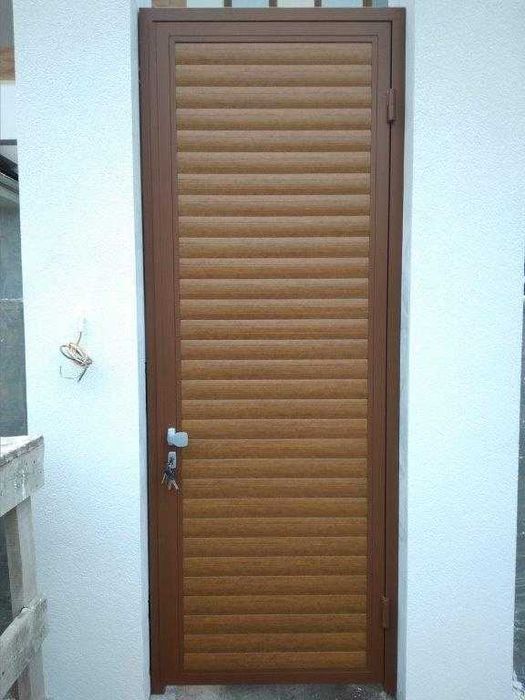 Ролеты на вьезд с калиткой для дома от компании "Элпол"