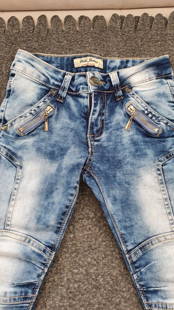 Super spodnie jeansowe z butiku Modnisia