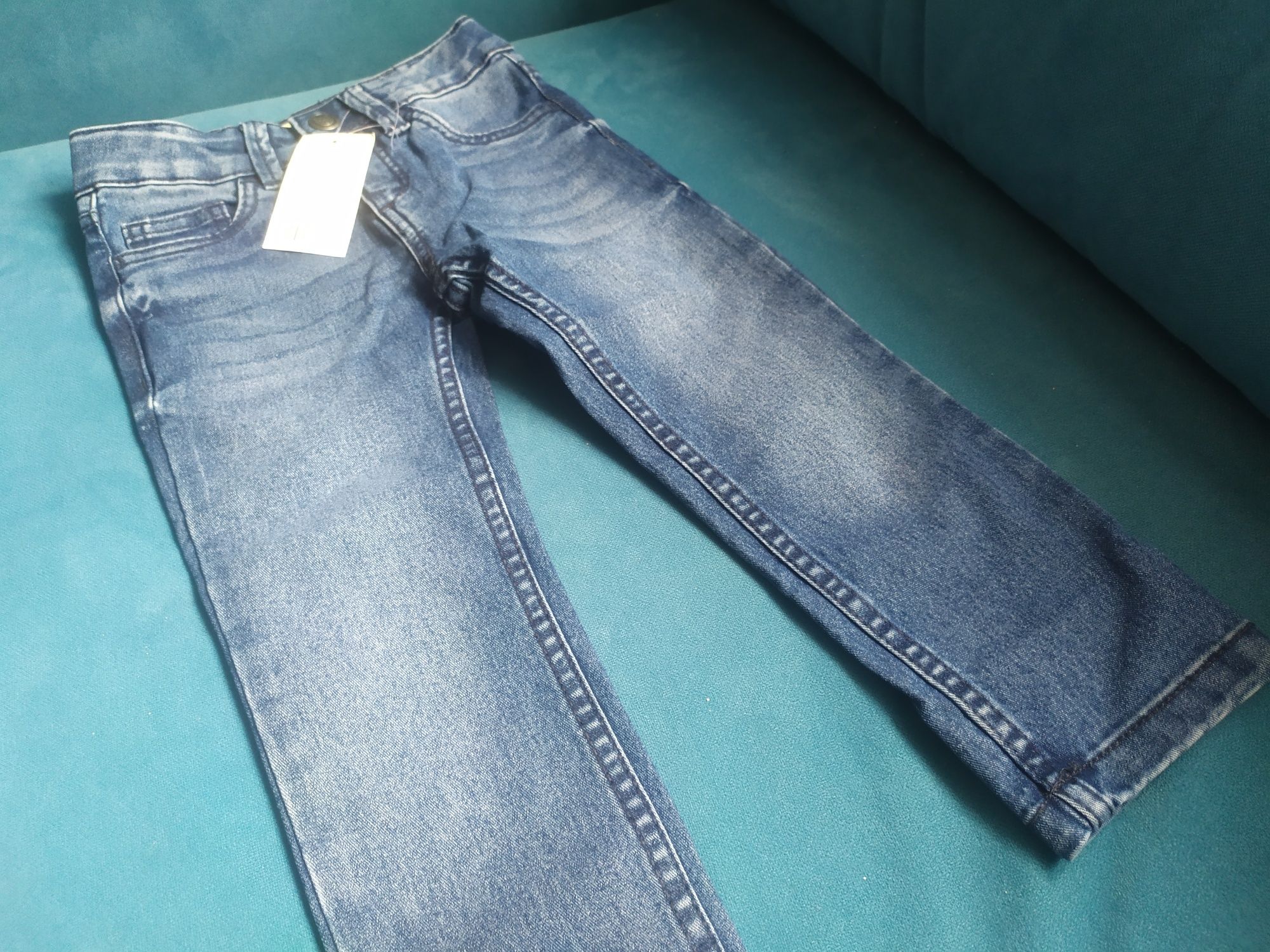 Nowe spodnie jeansowe  slim fit  98/104