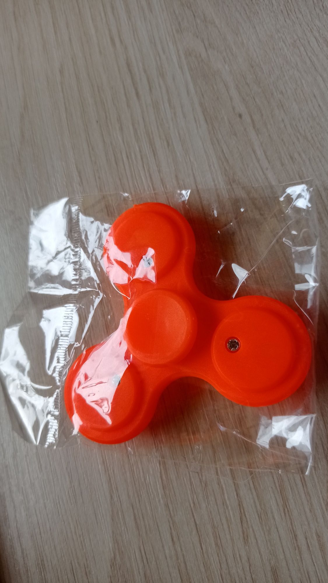 Fidget spinner spiner - nowy w folii, nieużywany - kol.jaskrawy orange