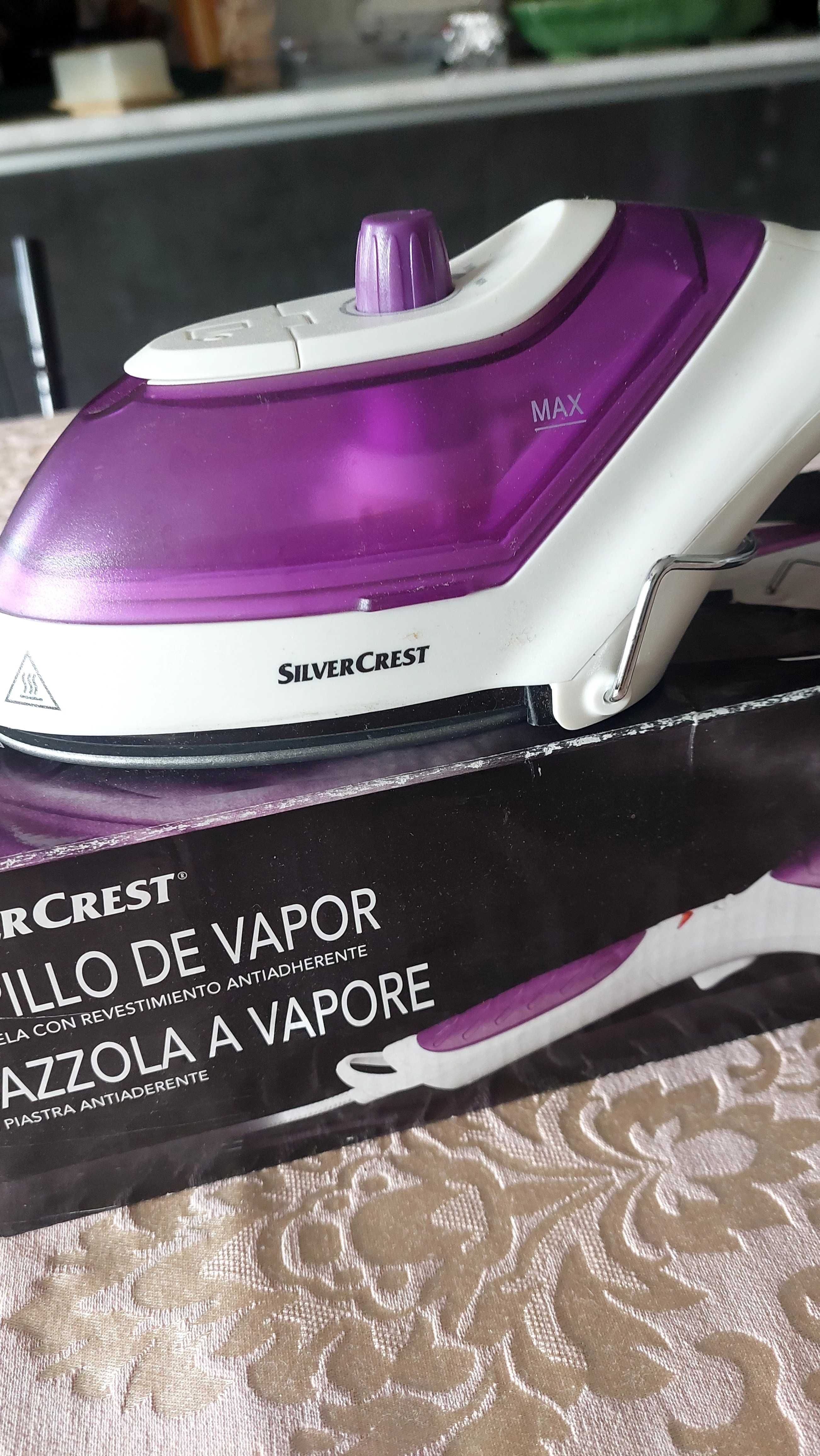 Ferro de viagem a vapor