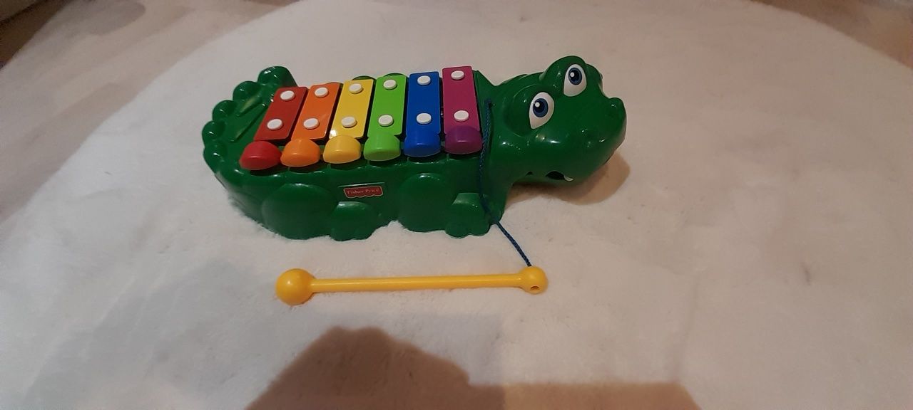 Krokodyl muzyczny cymbałki Fisher price