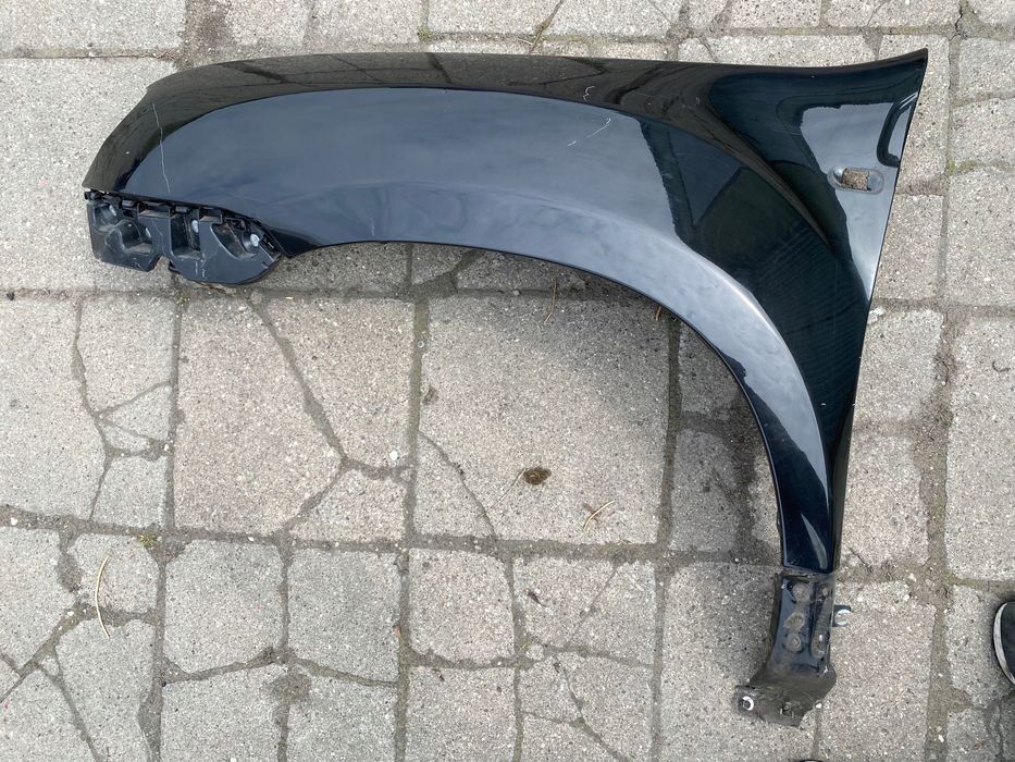 blotnik dacia duster i lewy przód