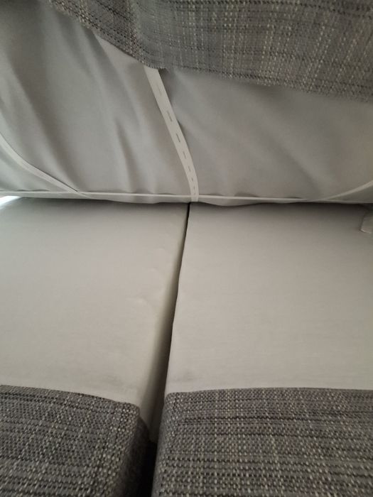 Szare tapicerowane 2 osobowe łóżko