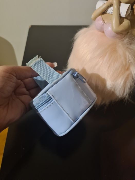 Porta chupeta forrado com emblema em prata