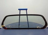 Скло кришки багажника  Mitsubishi L200 2006-2014 року