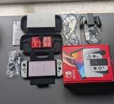 Nintendo Switch OLED 64GB + etui + szkło ochronne, pełny zestaw