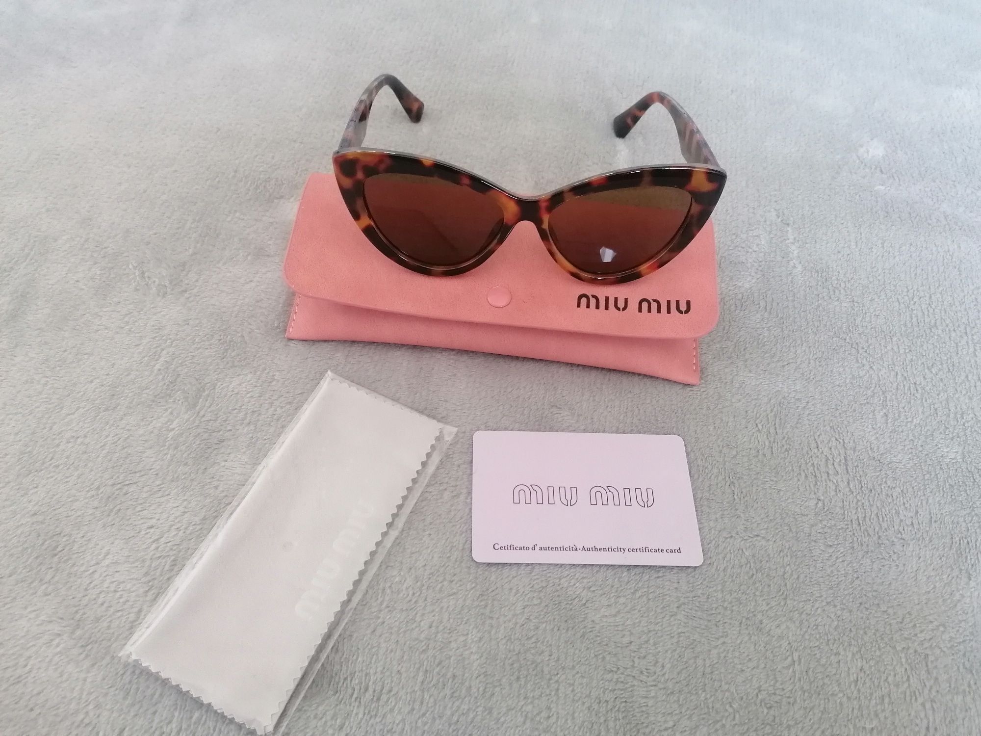 Oculos de sol Miu Miu