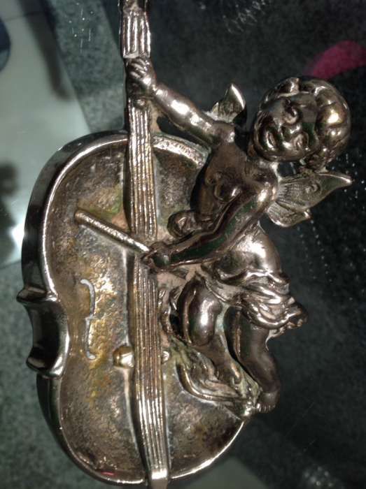 Cinzeiro antigo metal em forma de anjo
