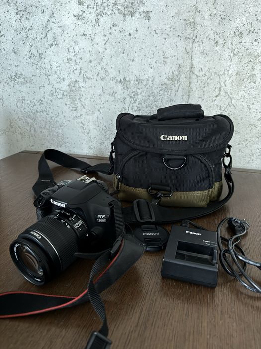 Canon EOS 1300D aparat lustrzanka torba akumulator obiektyw