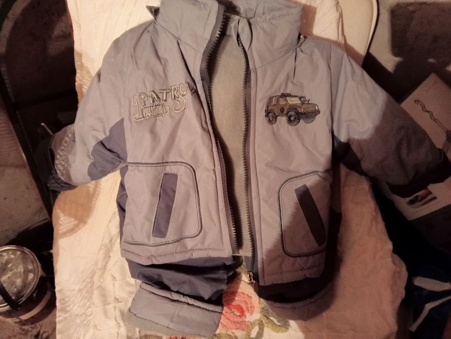 Kombinezon kurtka z kapturem na 6 M nowa