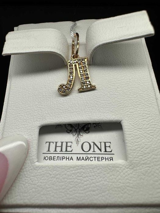 Різноманітні золоті підвіски