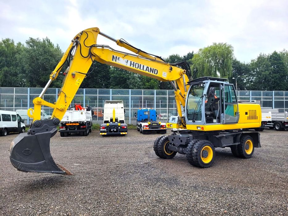 New Holland WE 190 Koparka kołowa 3 ramienna 5803mth Dwuczęściowy  NEW HOLLAND WE190 koparka kołowa 3 ramienna 5803mth
