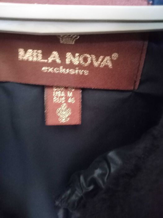 Пуховик зимовий чорний оздоблений  натуральним хутром