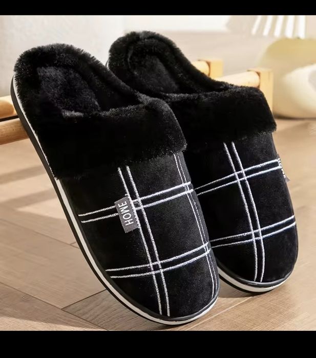 Продам мужские теплые тапочки размер на  42-43.