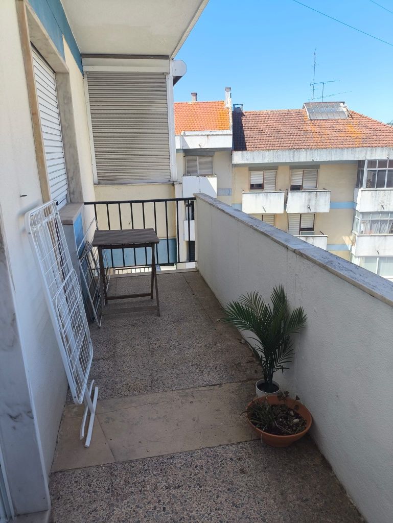 Quarto com Varanda