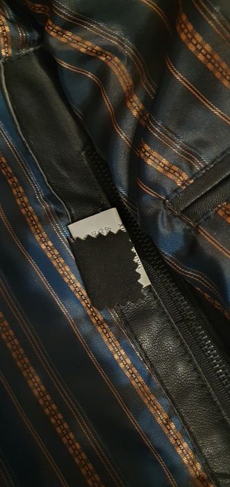 Пиджак/Куртка кожаная.